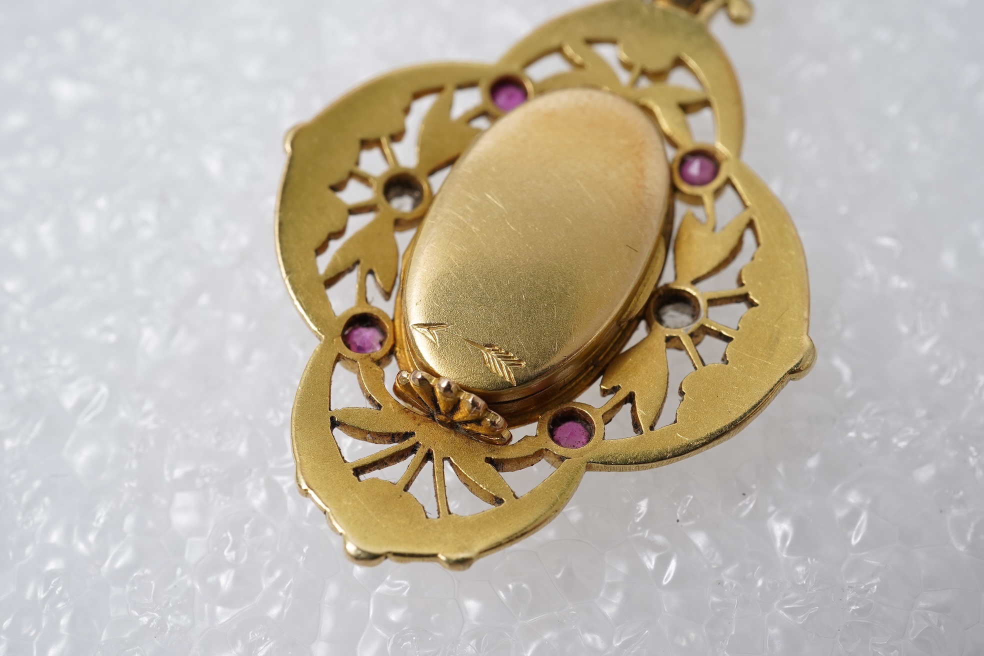 An Art Nouveau ruby and diamond locket pendant, France, circa 1900
